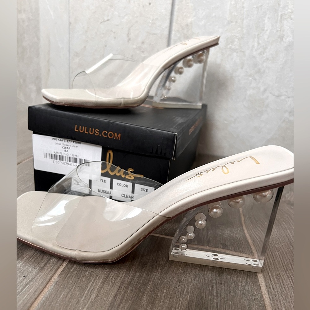Lulu’s clear pearl wedge-style heels